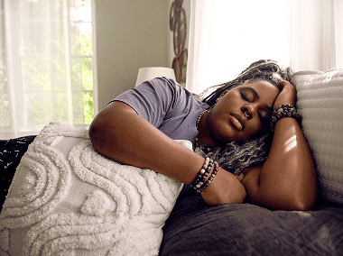 Woman with narcolepsy type 1 sleeping in bed