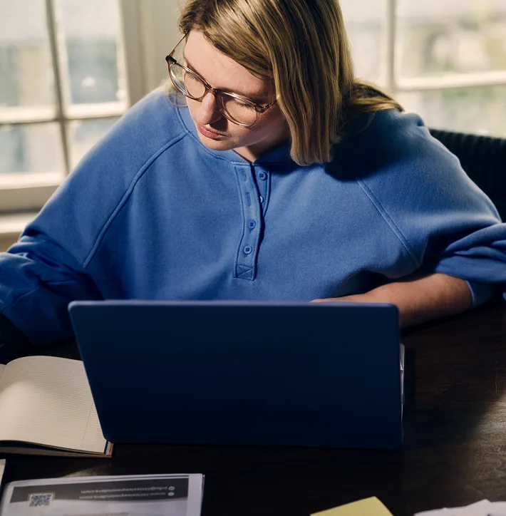 Woman with narcolepsy type 1 studying at her desk
